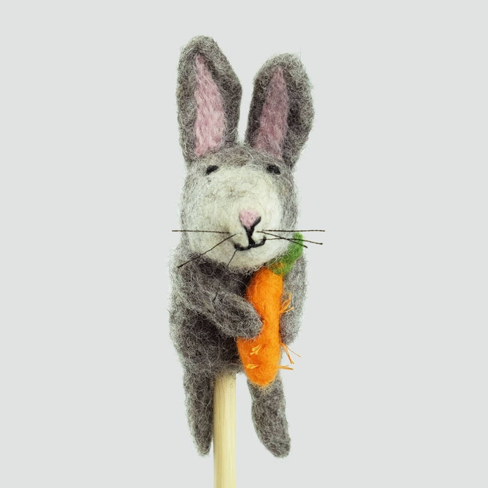 Handcrafted grey rabbit finger puppet made from natural wool, featuring pink ears and a white fluffy tail