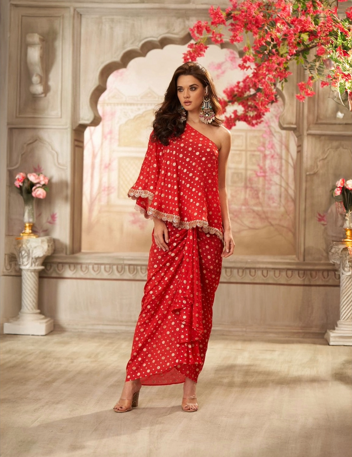 Red chinon one shoulder top with pleated skirt